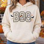 Ivory hoodie mockup showing the BOO ghost Halloween design across the chest