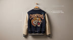 Jacket on a hanger displaying an embroidered logo from a digitized stitch file